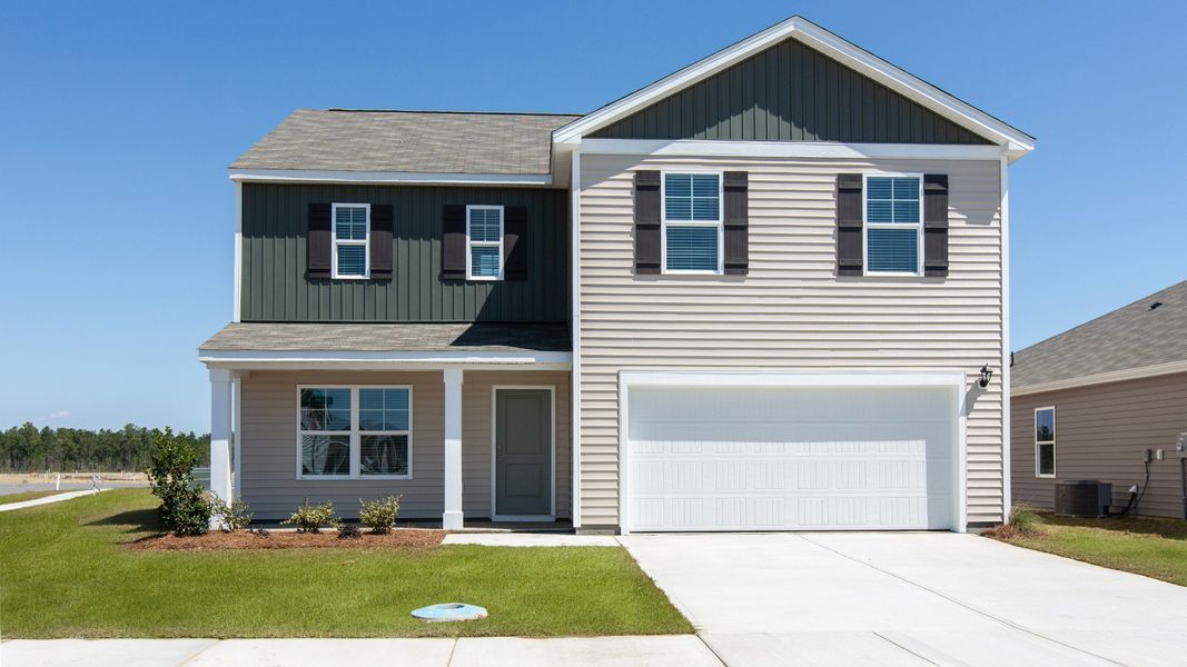 Front exterior of a home in the Patriot Pointe at Towne Pointe community, located in Jacksonville, NC (Image 5). Front exterior of a home in the Patriot Pointe at Towne Pointe community, located in Jacksonville, NC (Image 5).