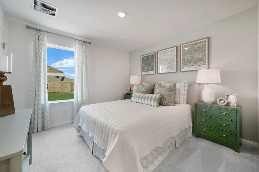 Furnished interior in a model home at Stonewall Ranch 40s in Liberty Hill (Image 22).