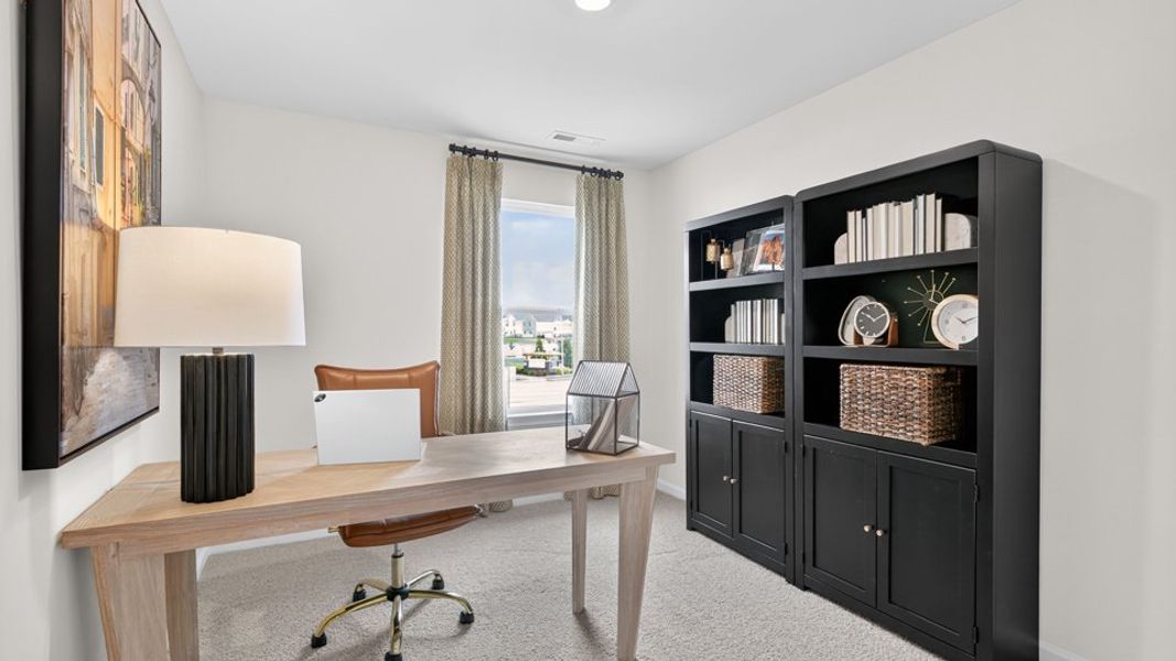 Furnished interior in a model home at The Townes at Belle Grove in Wendell (Image 33).