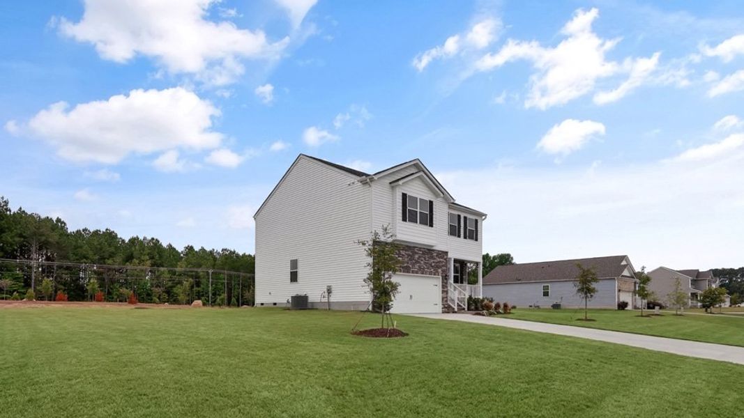 Front exterior of a home in the Baker Farm community, located in Youngsville, NC (Image 11).