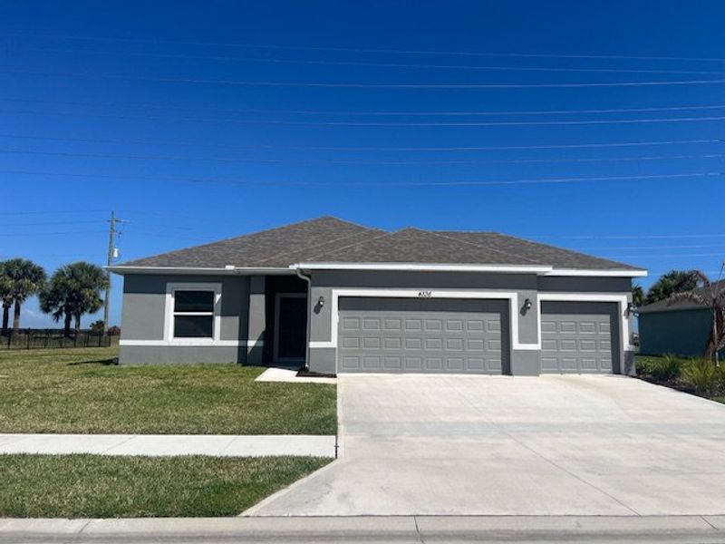Front exterior of a home in the Lakes At St Sebastian community, located in Sebastian, FL (Image 3).