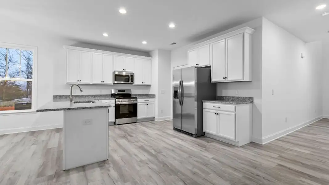 Furnished interior in a model home at Pearson Road Townhomes in Easley (Image 4).