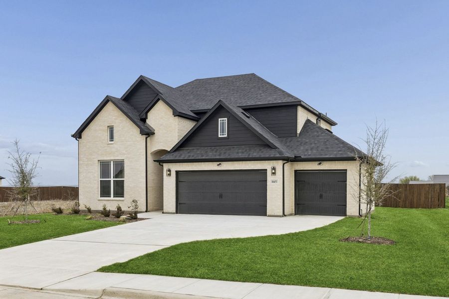 Front exterior of a home in the Brahman Ranch community, located in Venus, TX (Image 11).