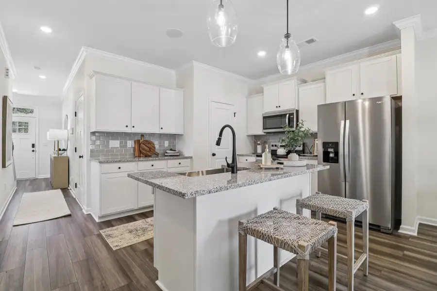 Furnished interior in a model home at Walker’s Trail in Lexington (Image 7).