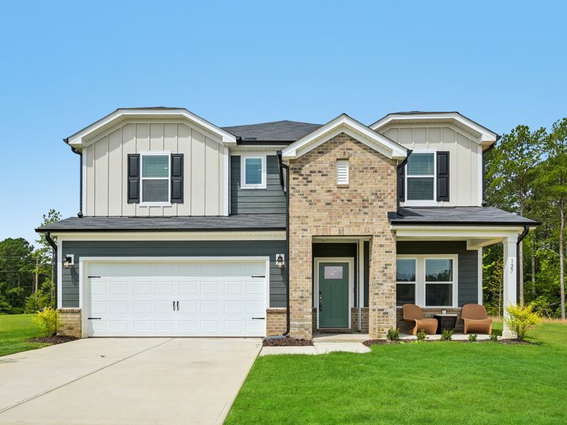 Front exterior of a home in the Country Lane - Signature Series community, located in Clayton, NC (Image 1). Front exterior of a home in the Country Lane - Signature Series community, located in Clayton, NC (Image 1).
