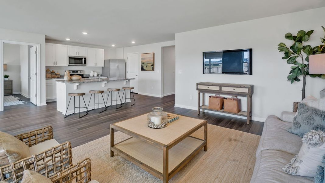 Furnished interior in a model home at Mariners Reach in Bolivia (Image 16).