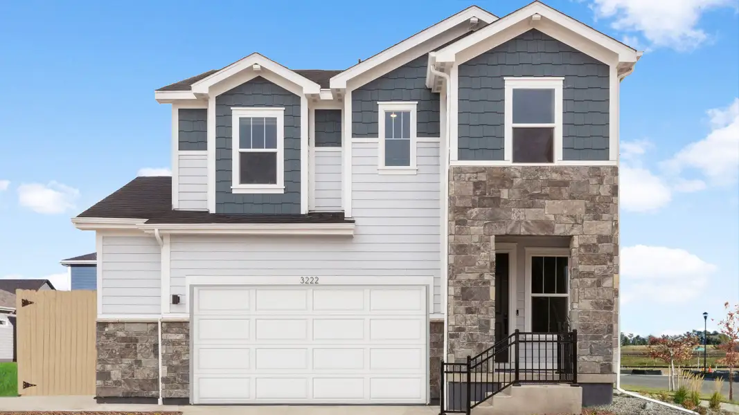 Beautiful two-story home exterior showcasing thoughtful design and curb appeal. Beautiful two-story home exterior showcasing thoughtful design and curb appeal.