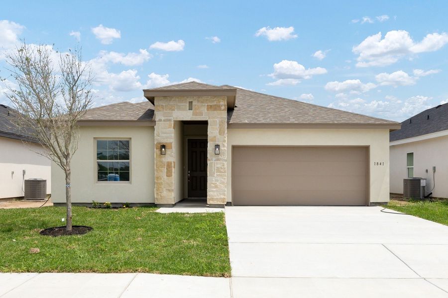 Front exterior of a home in the Paloma Ranch community, located in Harlingen, TX (Image 26).