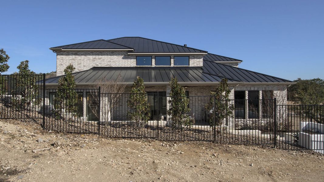 Front exterior of a home in the The Dominion 70' community, located in San Antonio, TX (Image 4). Front exterior of a home in the The Dominion 70' community, located in San Antonio, TX (Image 4).