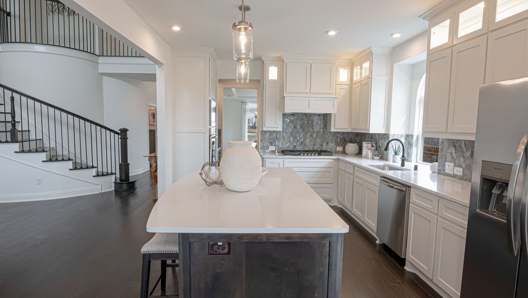 Furnished interior in a model home at High Country in Burleson (Image 2).