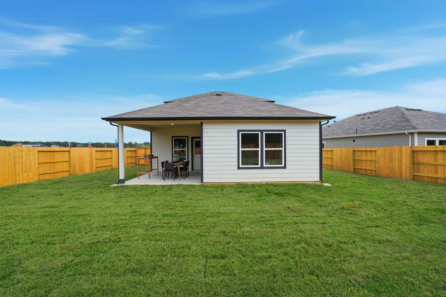 A house with a fence around it.