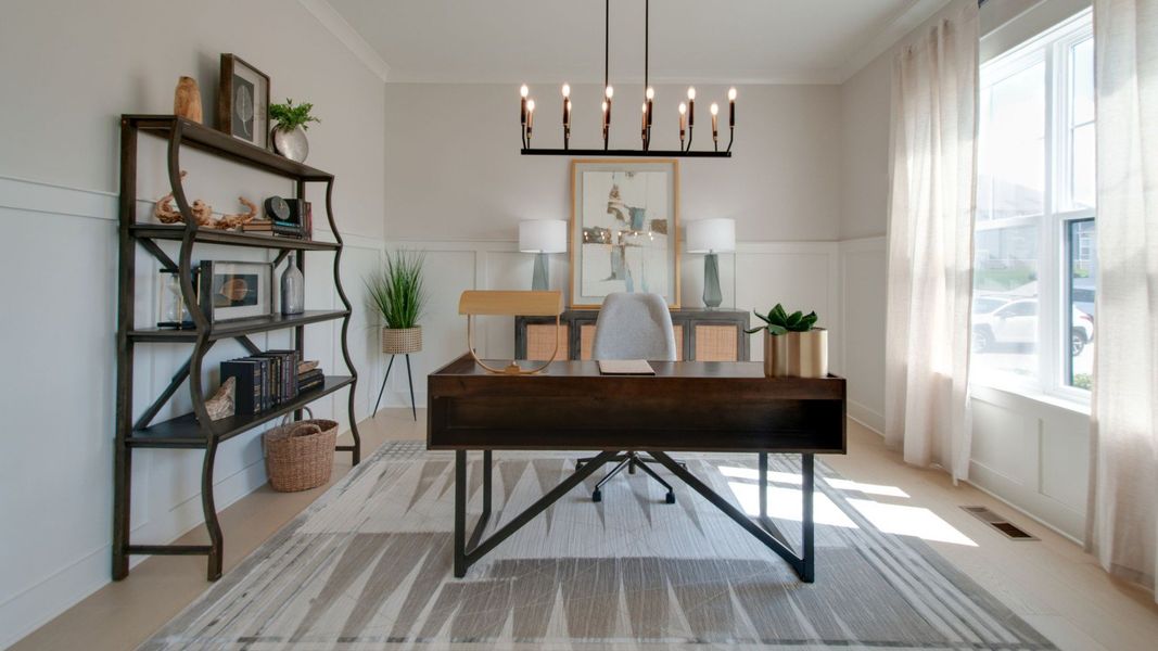Study with chandelier, hard surface flooring, and bright natural light Study with chandelier, hard surface flooring, and bright natural light