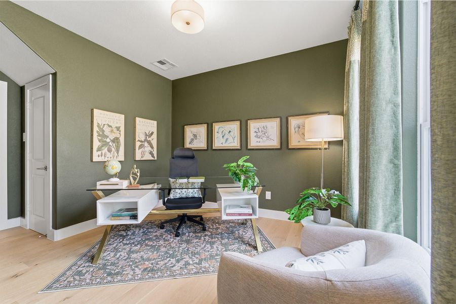 Furnished interior in a model home at Sundance Cove in Crosby (Image 7).