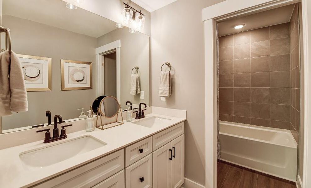 Furnished interior in a model home at Twin Creek Forsyth in Kernersville (Image 38).