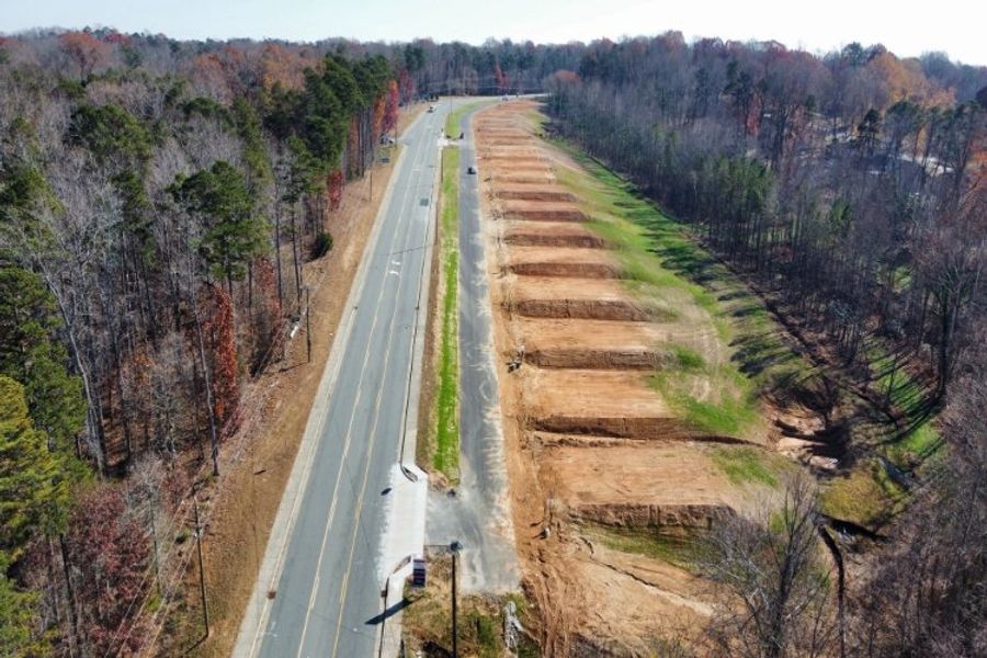 A highway with a car on it. A highway with a car on it.