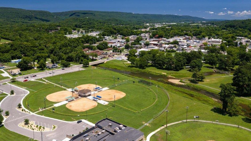 Aerial view of the Owensby Farms Townhomes community in Dayton, TN, showing layout and nearby surroundings (Image 12).