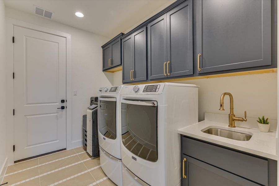 Furnished interior in a model home at Scofield Farms Estates in Georgetown (Image 28).