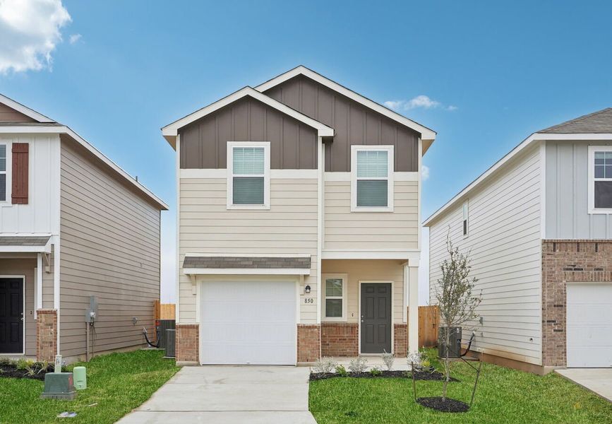 Front exterior of a home in the The Wilder community, located in Adkins, TX (Image 9).