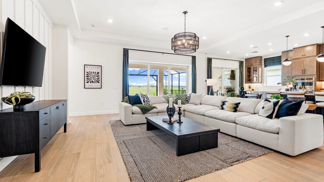 Furnished interior in a model home at Esplanade at Kingston in Estero (Image 17).