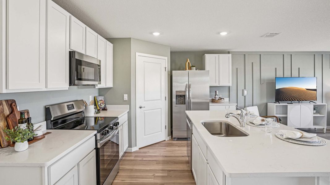 Furnished interior in a model home at Fletcher Trace in Alachua (Image 5).