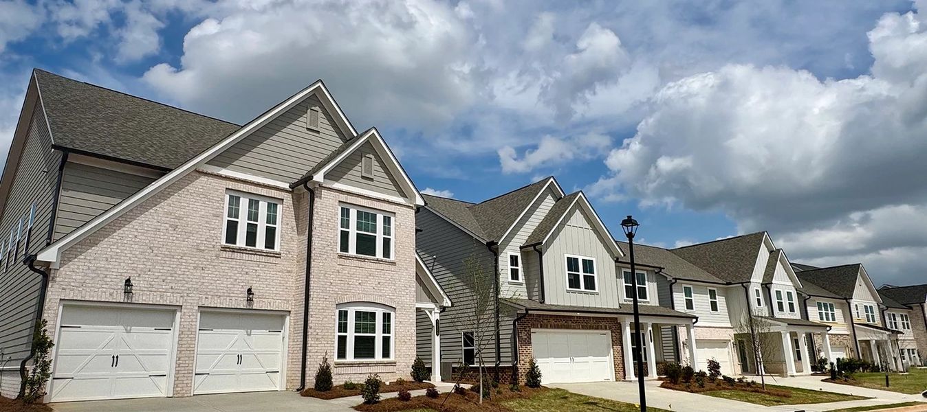 Front exterior of a home in the Eastlyn Crossing - Single Family community, located in Flowery Branch, GA (Image 1). Front exterior of a home in the Eastlyn Crossing - Single Family community, located in Flowery Branch, GA (Image 1).