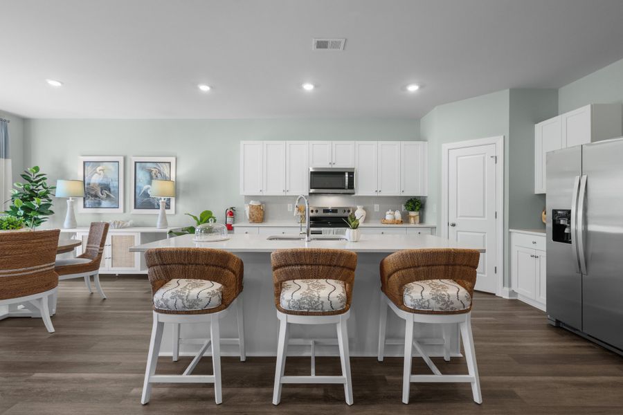 Furnished interior in a model home at Creekview Landing in Shallotte (Image 7).