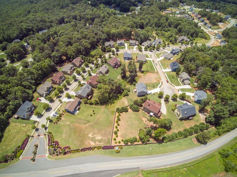 Aerial view of the The Reserve At Liberty Park community in Hoschton, GA, showing layout and nearby surroundings (Image 12). Aerial view of the The Reserve At Liberty Park community in Hoschton, GA, showing layout and nearby surroundings (Image 12).