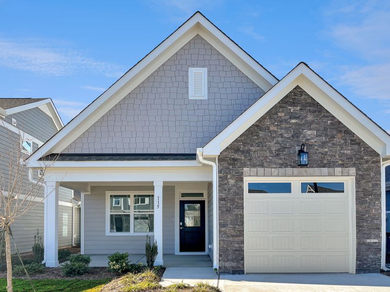 Front exterior of a home in the The Walk at East Village community, located in Clayton, NC (Image 27). Front exterior of a home in the The Walk at East Village community, located in Clayton, NC (Image 27).