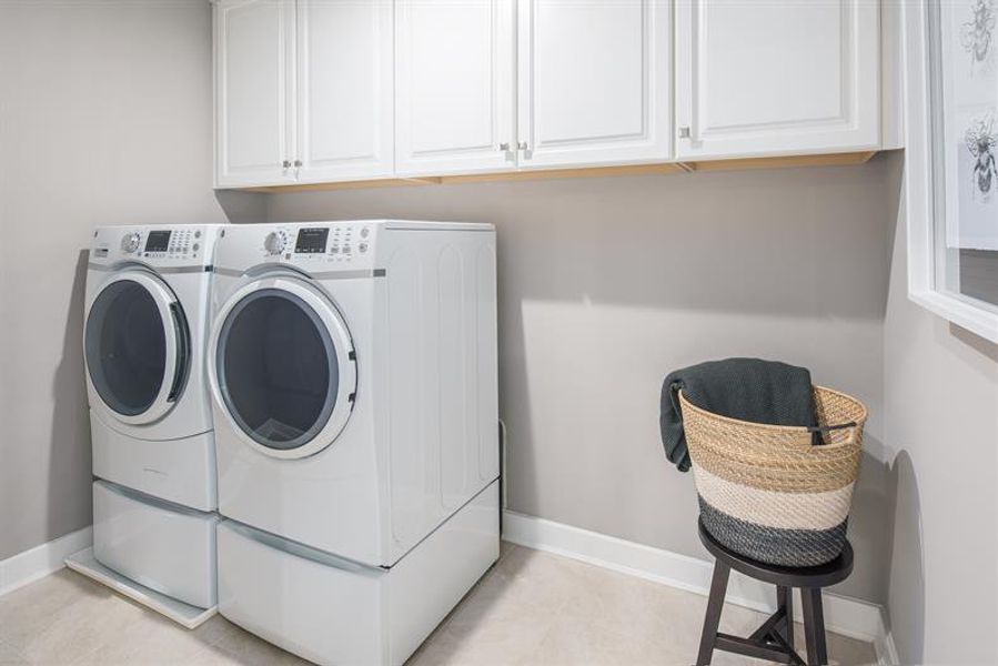 Escape dark, cramped laundry corners with a room that actually works for your family’s routine.