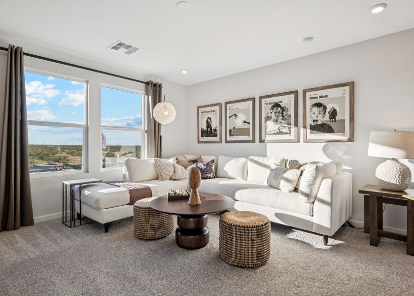 A living room with a large window.