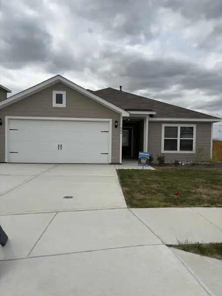 A charming single-story home with a two-car garage in Vista West by LGI Homes (Fort Worth, TX).