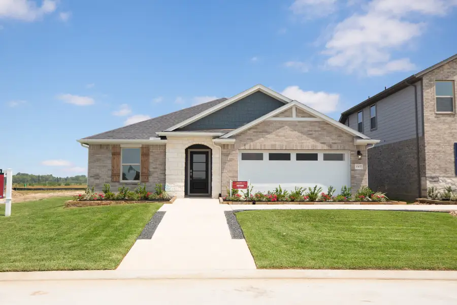 Front exterior of a home in the Sorella: Landmark Collection community, located in Tomball, TX (Image 4). Front exterior of a home in the Sorella: Landmark Collection community, located in Tomball, TX (Image 4).