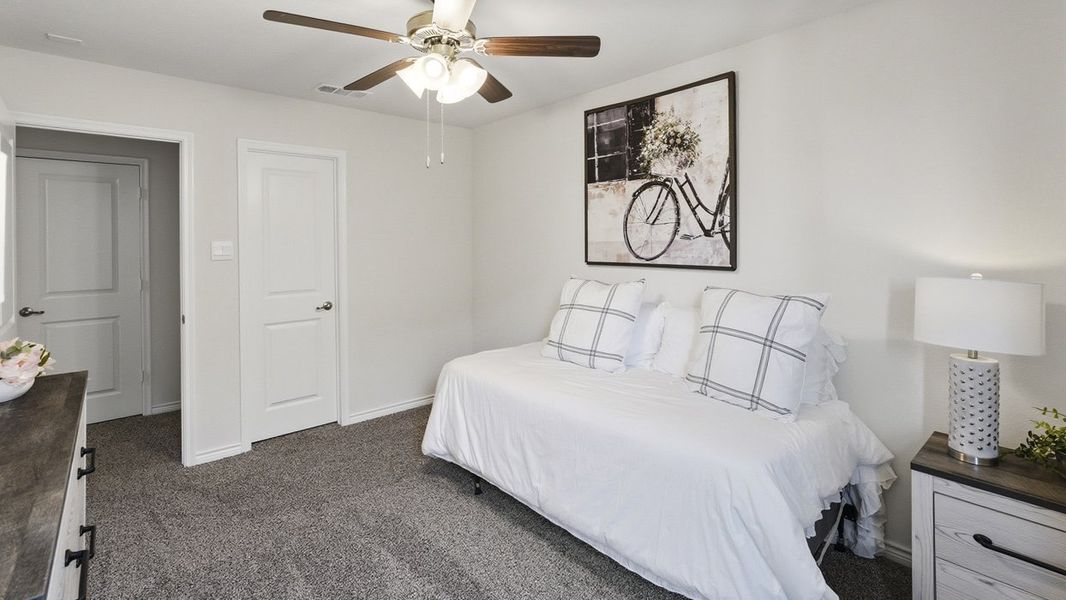 Furnished interior in a model home at The Woods at Lindsey Place in Anna (Image 77).