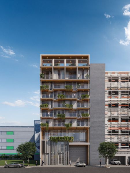 Front exterior of a home in the Milux Place community, located in Miami, FL (Image 4).