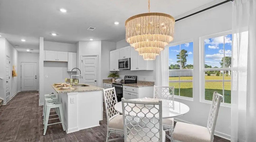 Furnished interior in a model home at Champions Park in Longs (Image 6).