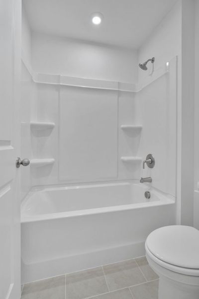 Furnished interior in a model home at Meadow Pines in Dallas (Image 38).