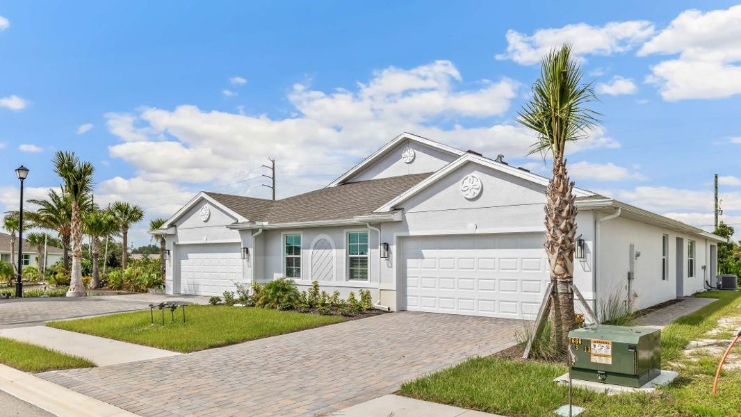 Front exterior of a home in the Sea Cove community, located in Punta Gorda, FL (Image 12).