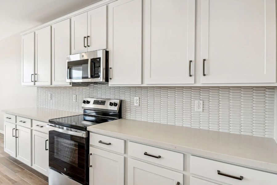 Furnished interior in a model home at Amarillo Creek in Maricopa (Image 7).