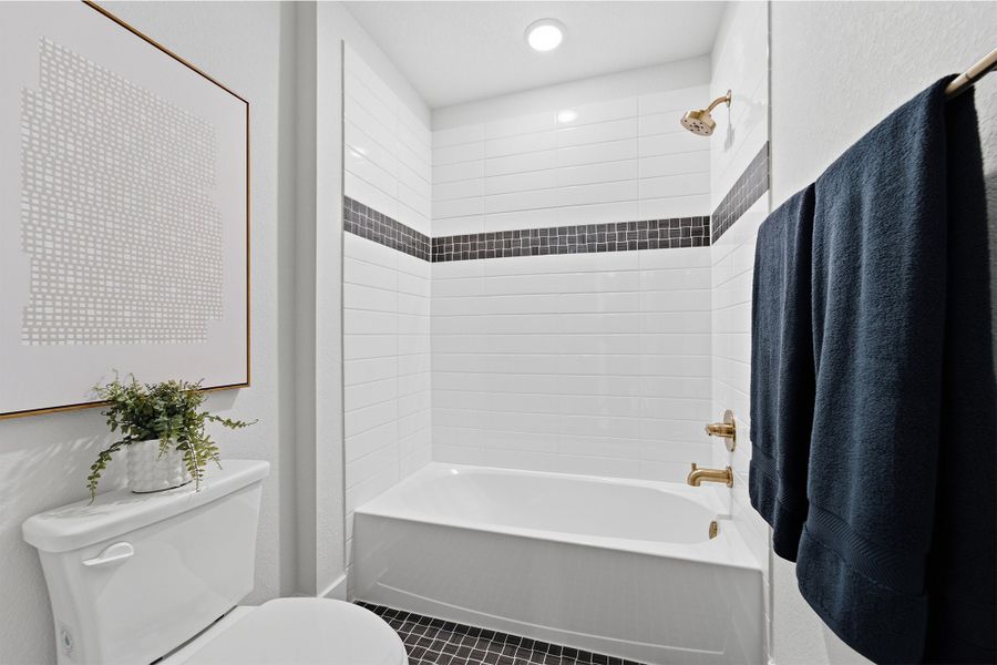 Furnished interior in a model home at Lariat in Liberty Hill (Image 47).