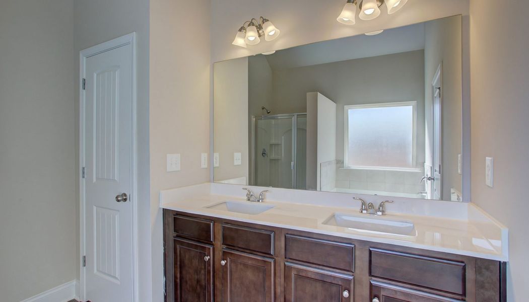 Furnished interior in a model home at North Village in Rydal (Image 13).
