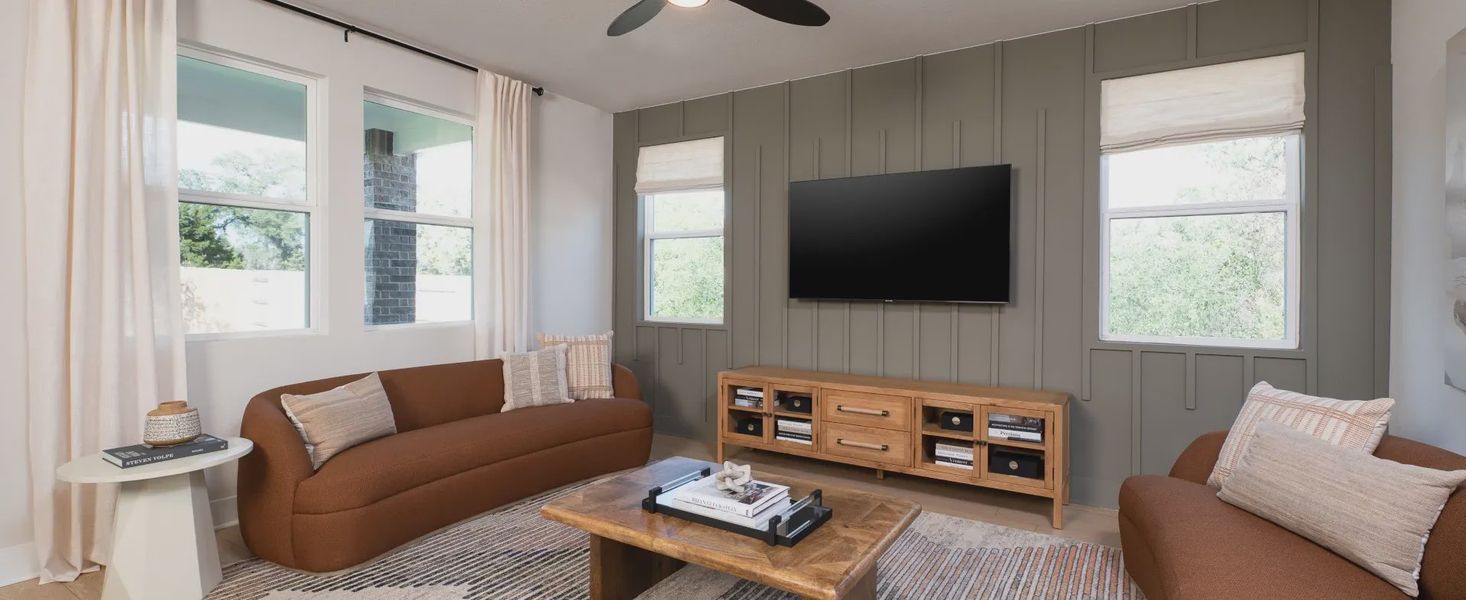 Furnished interior in a model home at Berry Creek Highlands in Georgetown (Image 5).