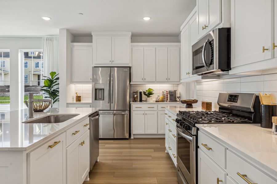 Furnished interior in a model home at Village on Main Street in Frisco (Image 27).