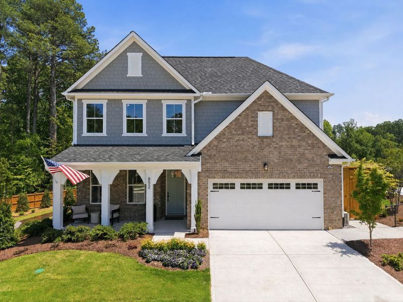Front exterior of a home in the Sage on North Main community, located in Wake Forest, NC (Image 1). Front exterior of a home in the Sage on North Main community, located in Wake Forest, NC (Image 1).