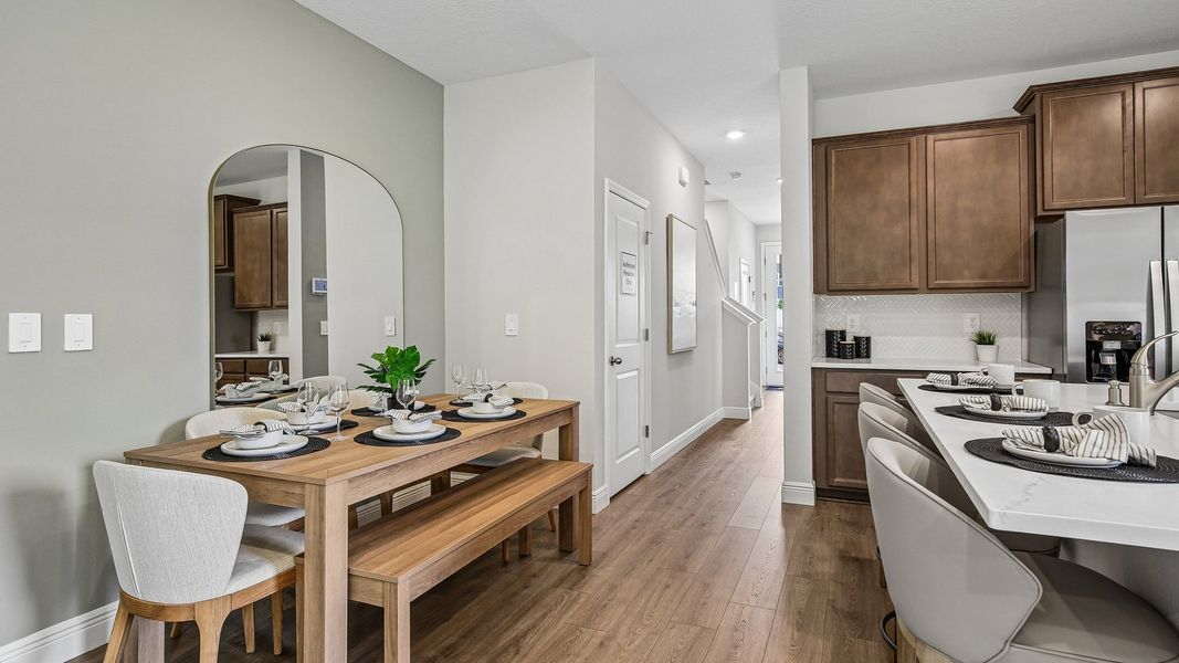 Furnished interior in a model home at Sanctuary at Citrus Park Townhomes in Tampa (Image 8).