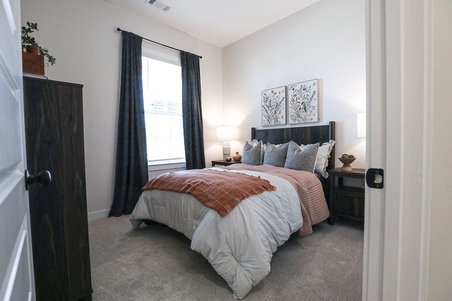 Furnished interior in a model home at Villages of Green Meadows in Munford (Image 25).