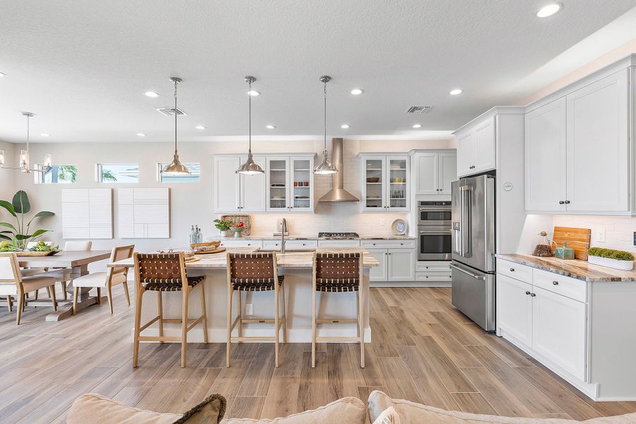 Furnished interior in a model home at The Sanctuary – Royal Collection in Punta Gorda (Image 12).