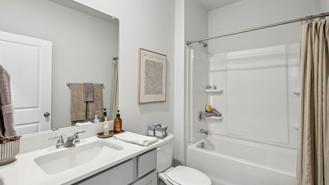 Furnished interior in a model home at CDJ Farms in Portland (Image 43).