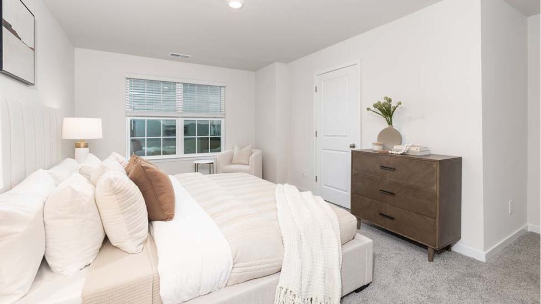 Furnished interior in a model home at The Townes at Troutman in Troutman (Image 11).