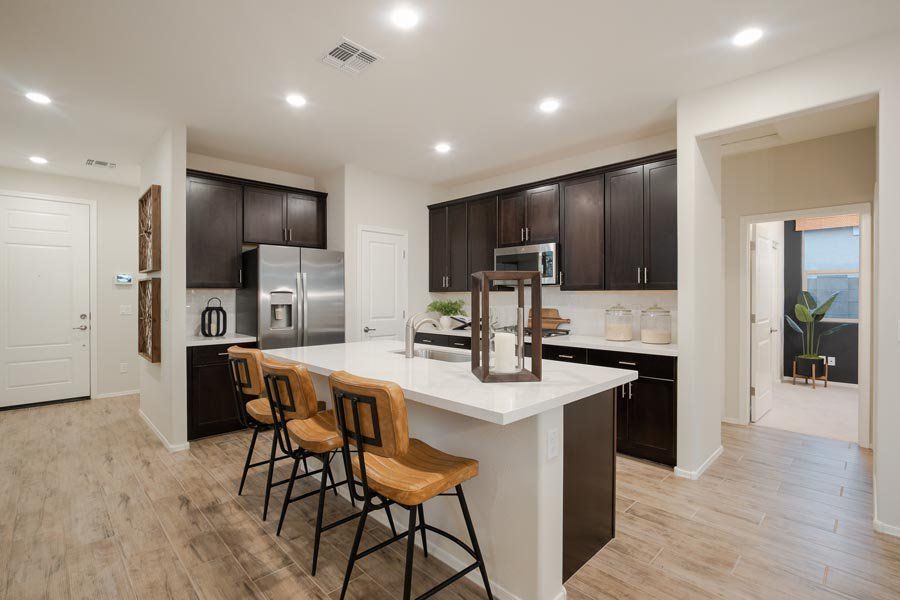 Furnished interior in a model home at Beacon Hill at Marley Park in Surprise (Image 36).