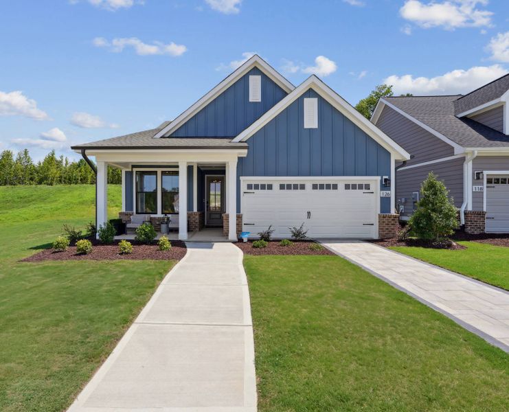 Front exterior of a home in the The Grove Collection at Serenity community, located in Fuquay Varina, NC (Image 2). Front exterior of a home in the The Grove Collection at Serenity community, located in Fuquay Varina, NC (Image 2).